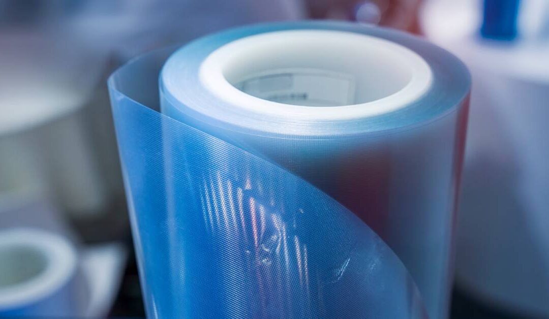 A polyethylene protective film wrapped around a tube. It has a light blue color with a reflective surface.